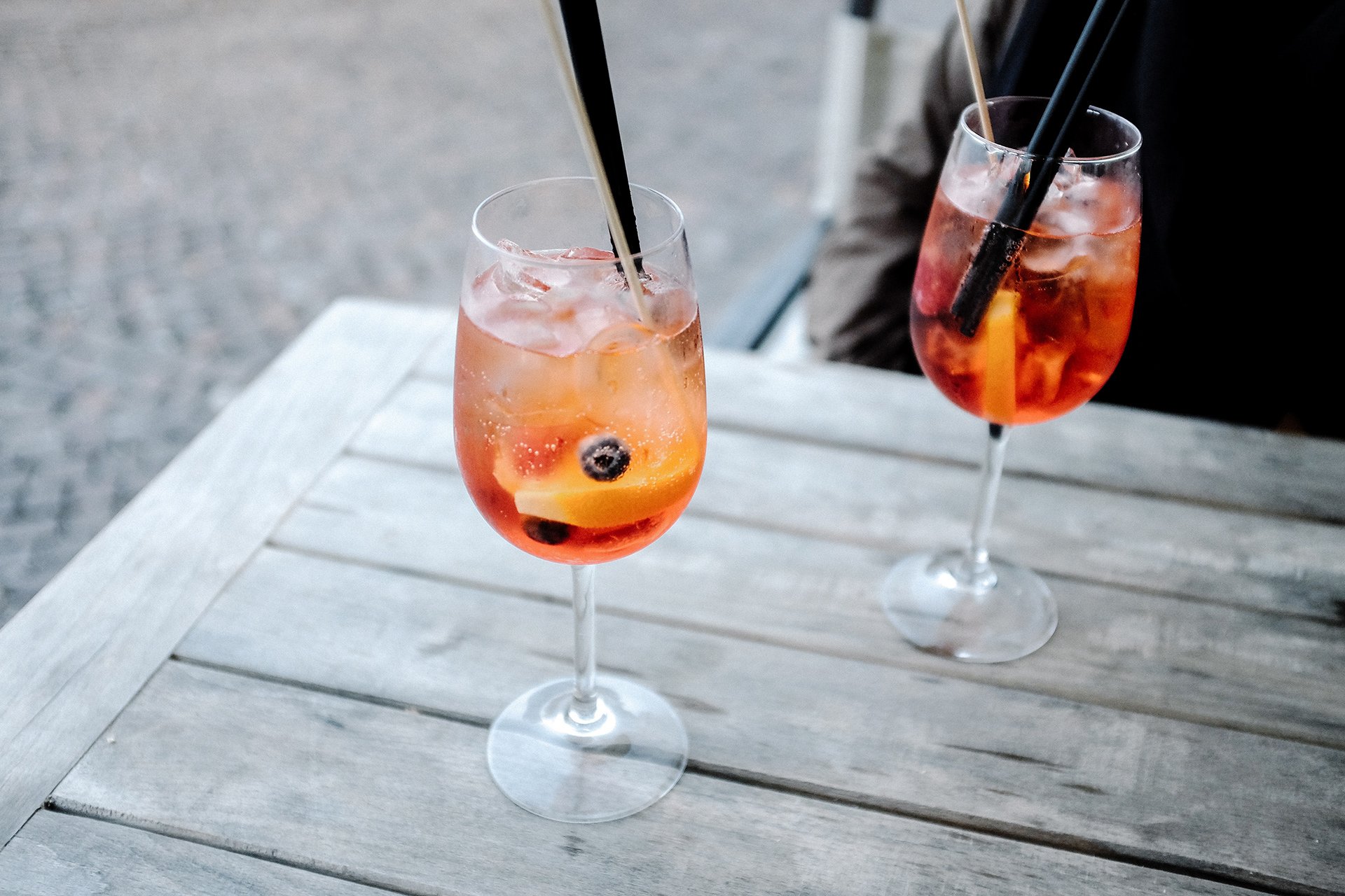 Friends talking together over afternoon drinks
